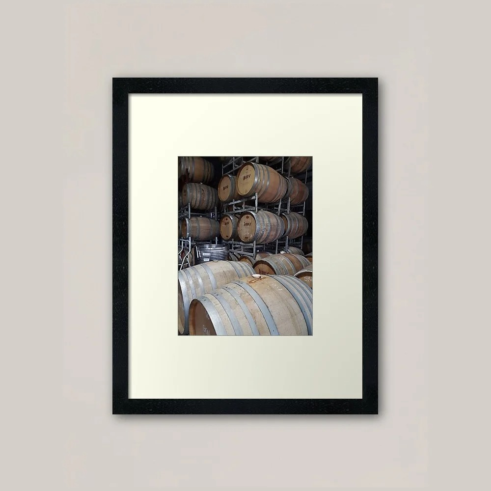 Framed photograph of wine barrels by Avril Thomas